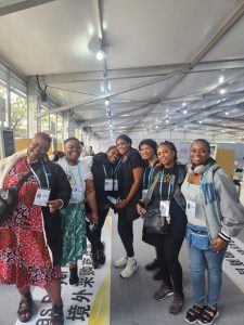 Group of female entrepreneurs at the entrance of the Canton Fair in Guangzhou, China.